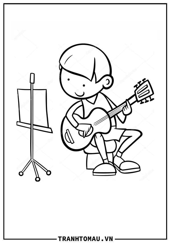 cậu bé chơi guitar theo bài